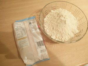 The shortcrust mix out of the packet and in the mixing bowl