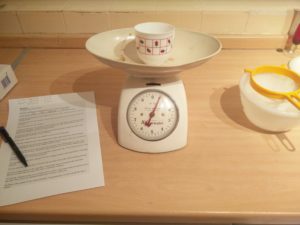 The weighing scales with cup used to measure items
