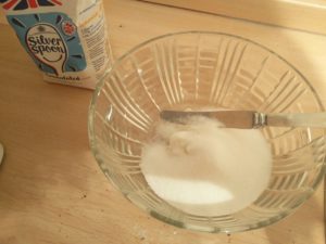 The sugar and vegetable shortening together in the mixing bowl