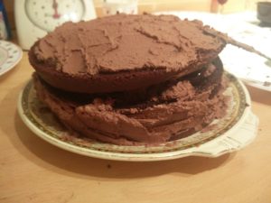 The frosting on the side of the cake