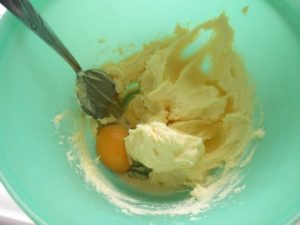 The sugar and butter has been mixed together and an egg added