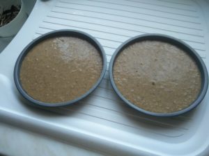The cake mix in the tins