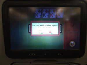 The flight screen showing the solitaire game I'd just won