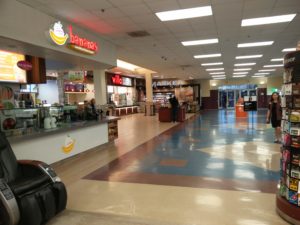 The inside of the food court with numerous restraunts