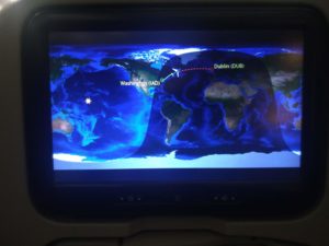 The map on the plane screen showing the plane before the midnight time zone