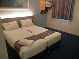 The hotel room that I would be staying in, showing two beds