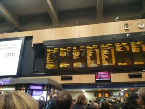 The departures boards at London Euston showing all of the trains apart form our scheduled one